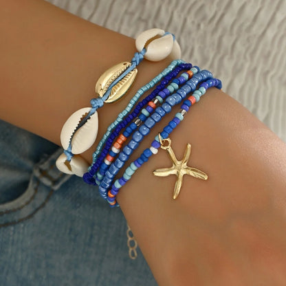 Summer Women's Bohemian Seven-Piece Set Bracelets - Shell Beaded Weaving Design with Starfish Pendant Fashionable Beach Jewelry